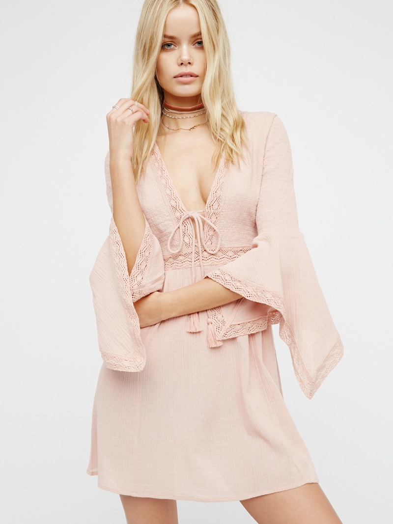 This gauzy mini dress from Endless Summer features flared sleeves