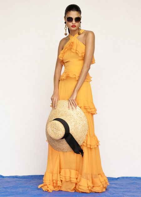 Daniela Braga Models FORWARD's Vacation-Ready Dresses Prabal Gurung Crepe de Chine Tiered Ruffle Gown, Chloe Square Nerine Sunglasses, Eugenia Kim Mirabel Hat, Marni Metal Earrings and Isabel Marant Etoile Leather Jusip Malick Sandals