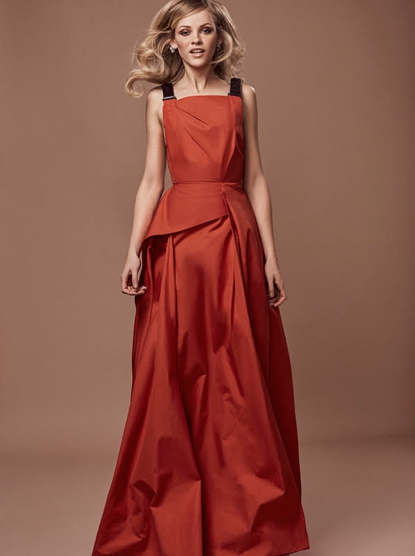 Ginta Lapina poses in red gown
