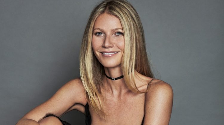 All smiles, Gwyneth Paltrow wears Valentino gown and Tous choker necklace