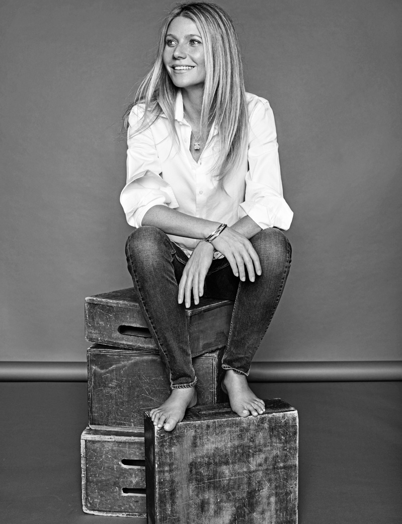 Keeping it casual, Gwyneth Paltrow poses in CH Carolina Herrera top, Reiko jeans and Tous jewelry