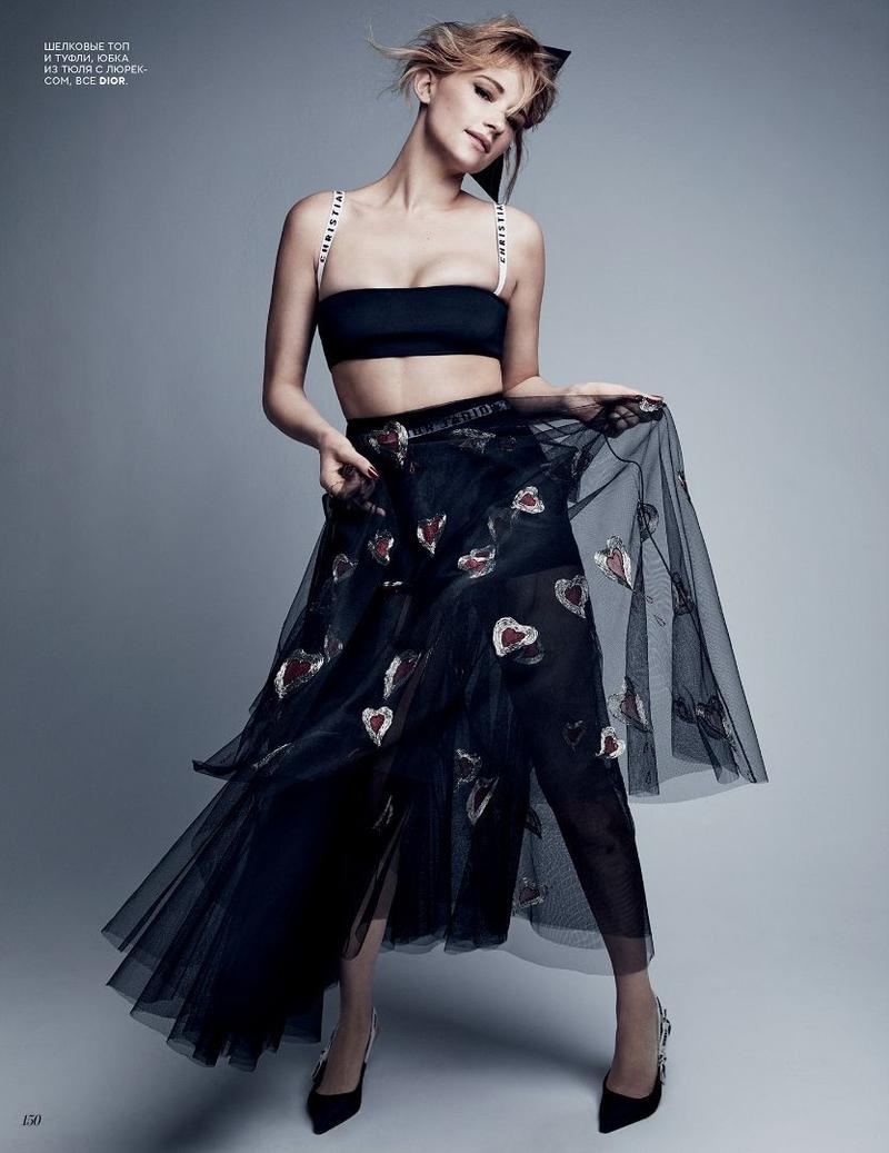 Haley Bennett poses in Dior bralette, embellished skirt and pumps
