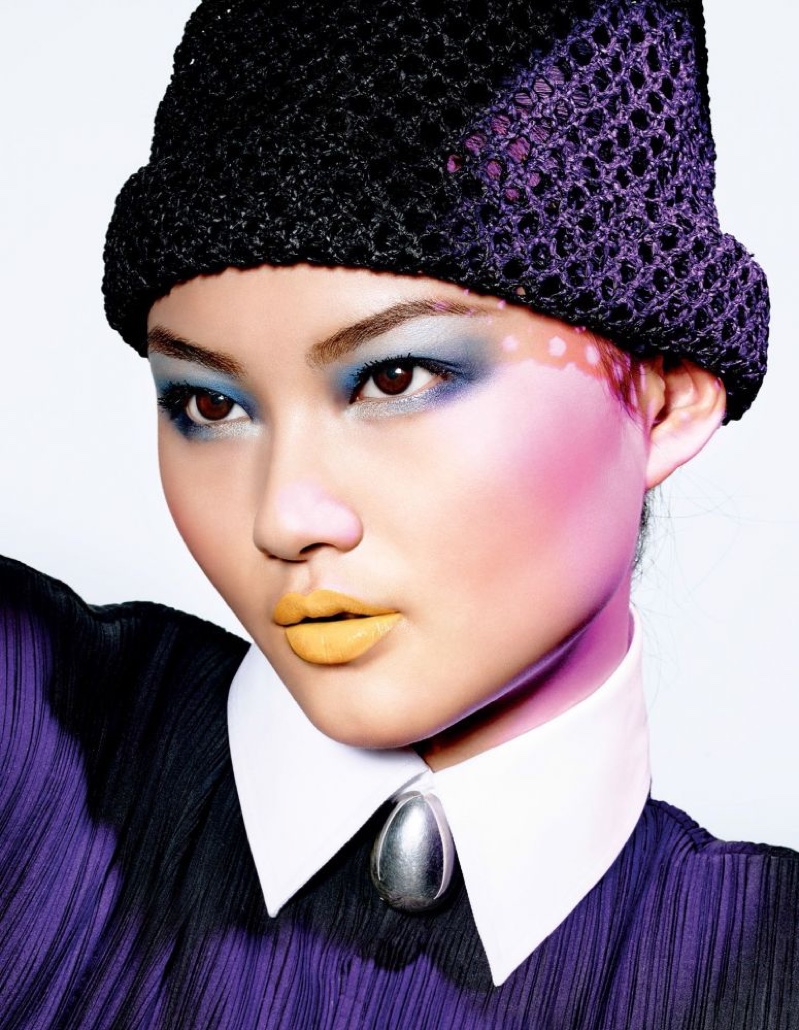 Makeup Creative and Image Director Peter Philips creates He Cong's vibrant blue eyeshadow and yellow lipstick look