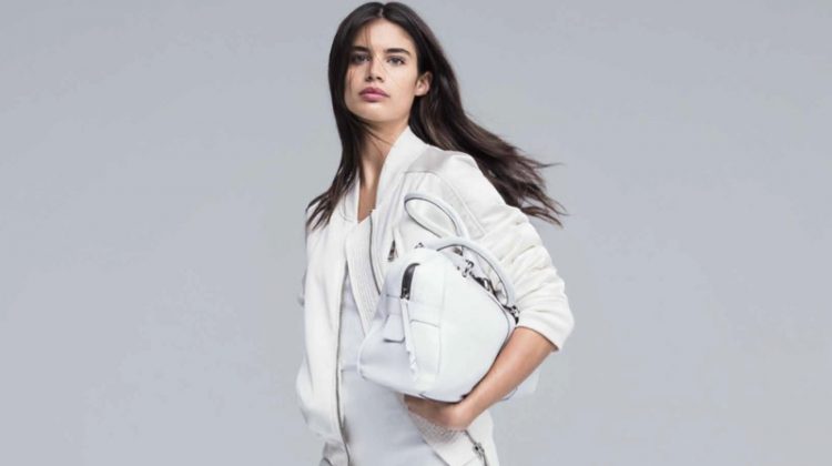 Sara Sampaio sports platform sneakers in Hogan’s spring 2017 campaign