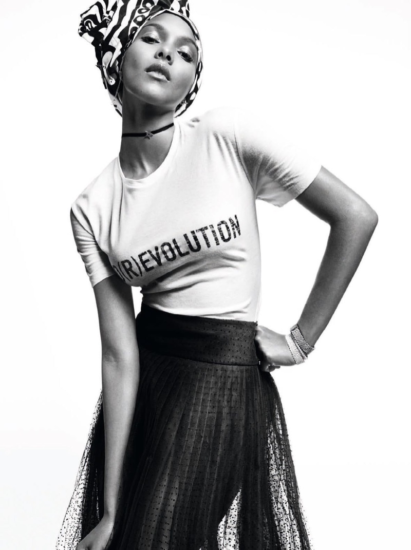 Photographed in black and white, Lais Ribeiro wears Dior shirt and tulle skirt