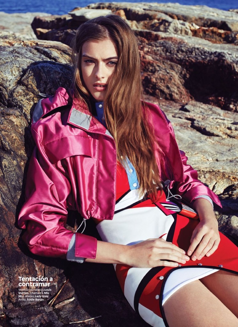 Embracing color, Lone Praesto wears Miu Miu jacket with Louis Vuitton asymmetrical dress