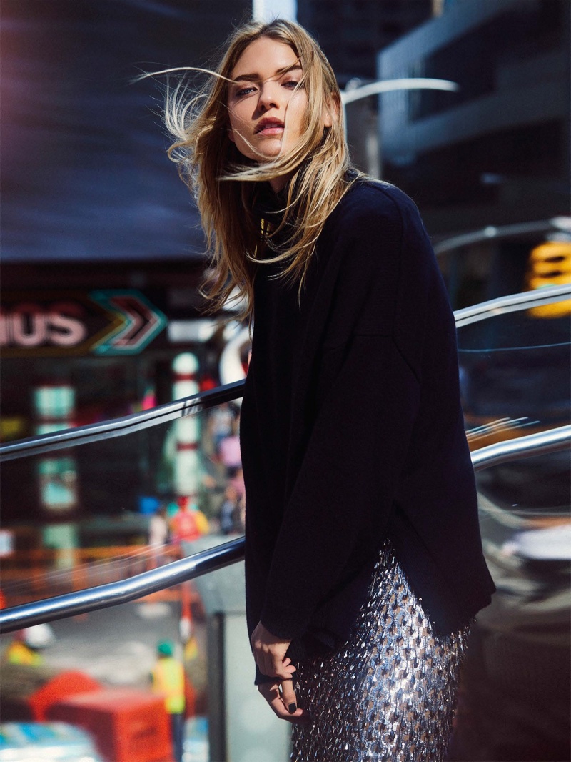 Model Martha Hunt wears Tibi sweater with Michael Kors Collection skirt