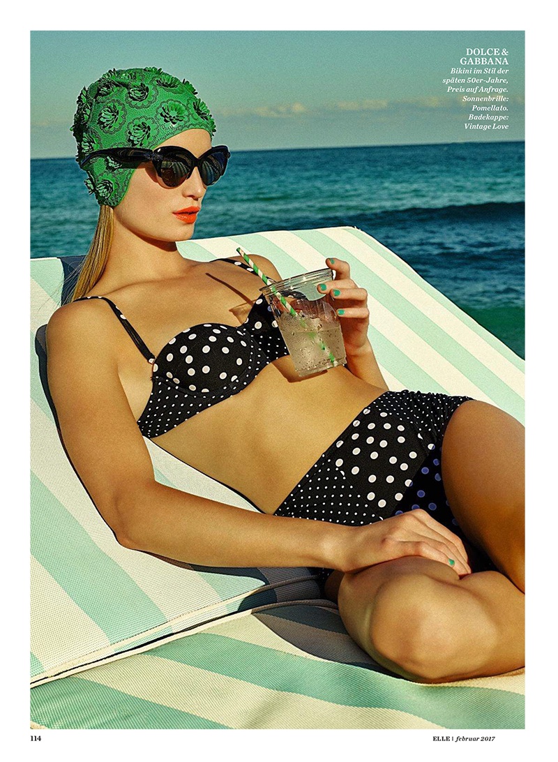 Lounging poolside, Maud Welzen wears Dolce & Gabbana polka dot print swimsuit and Pomellato sunglasses