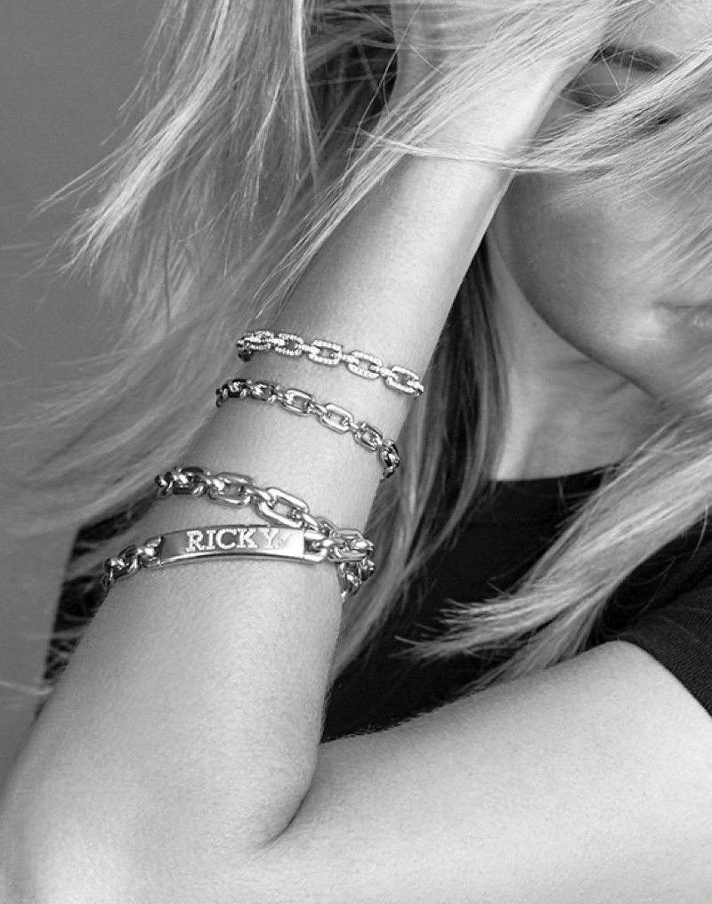 Ralph Lauren's chunky chain ID bracelet and bangles make for great layering pieces.