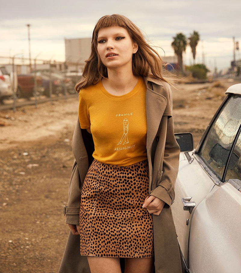 Reformation Mod Trench in Sand, Fragile Masculinity Tee in Sunflower and Gibson Skirt in Cheetah