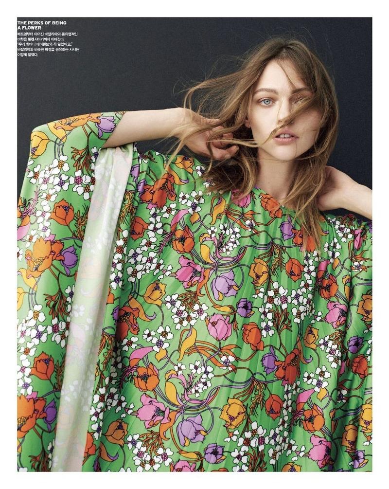 Embracing florals, Sasha Pivovarova models Balenciaga cape dress