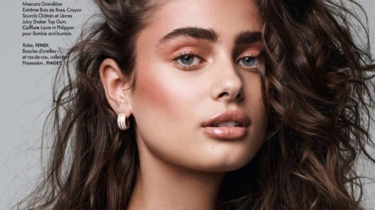Getting her closeup, Taylor Hill wears Fendi dress with Piaget necklace and earrings