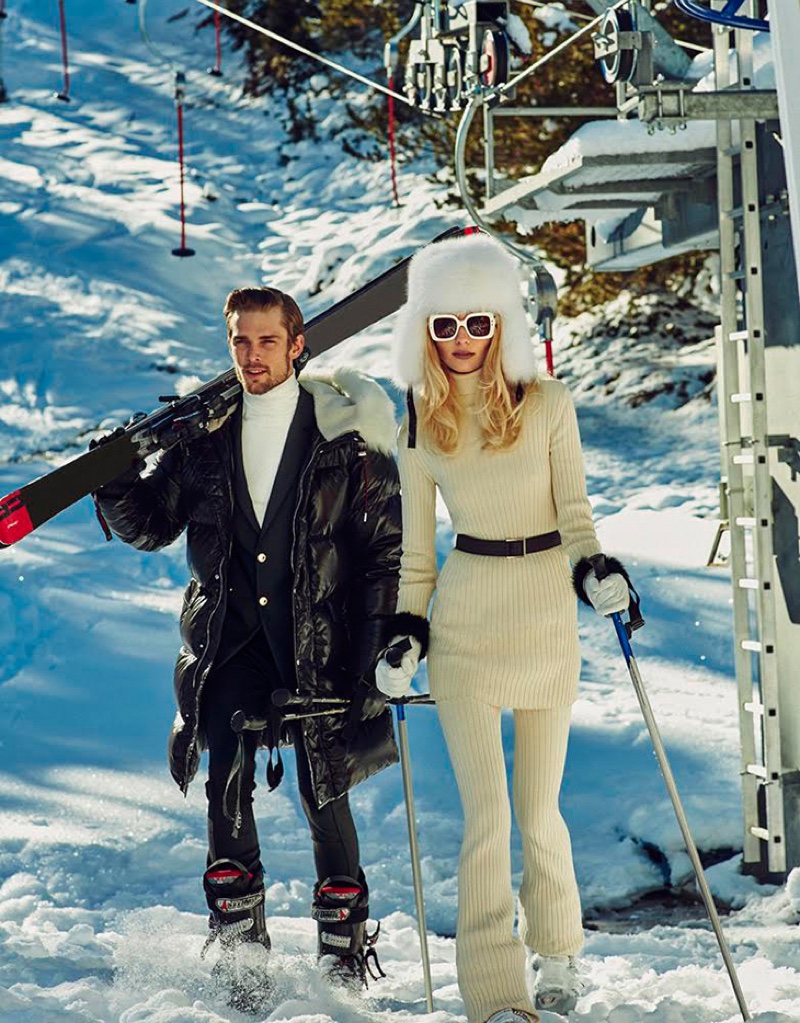 Vika Falileeva hits the slopes in white knitwear with fur hat