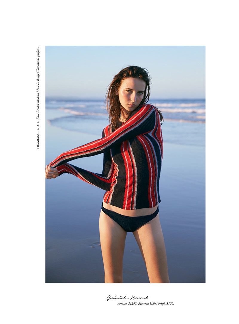 The model wears striped Gabriela Hearst sweater and Matteau bikini briefs