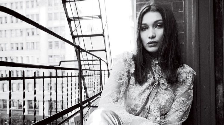Model Bella Hadid wears lace top and trousers