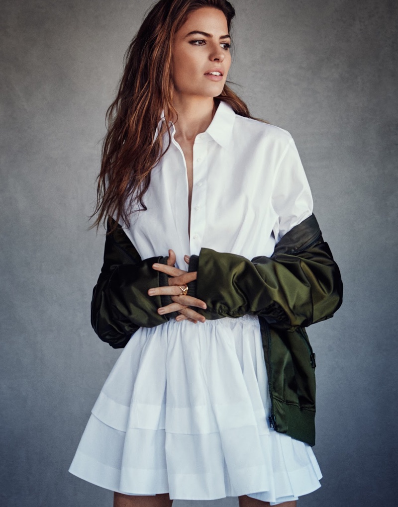 Cameron Russell poses in Acne Studios jacket, Alaia dress and Jennifer Fisher ring
