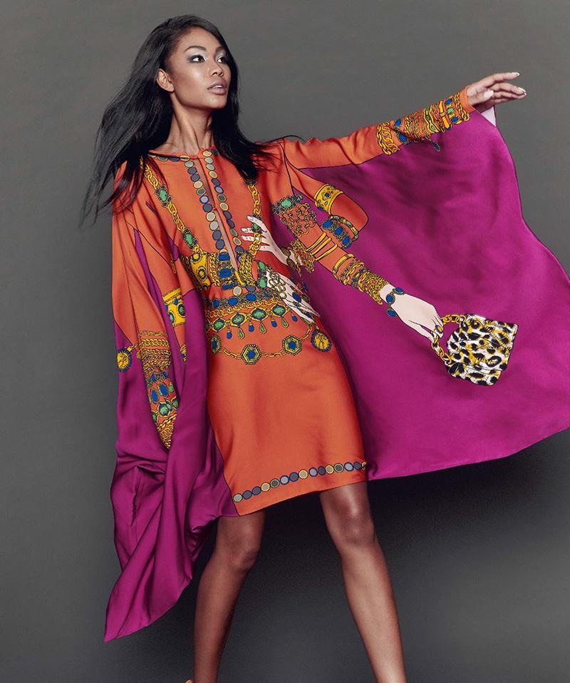 Model Chanel Iman wears embroidered caftan from Moschino