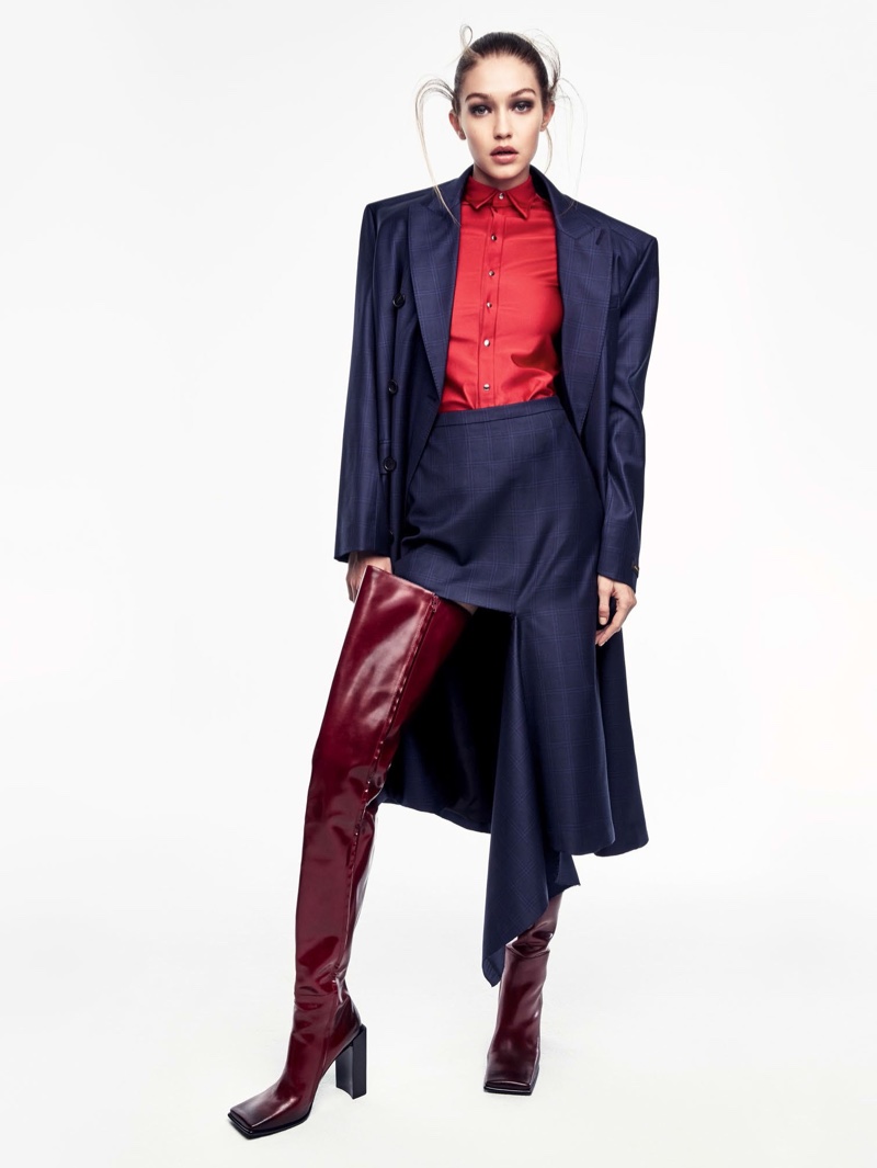 Gigi Hadid wears Balenciaga coat, shirt, skirt and thigh-high boots