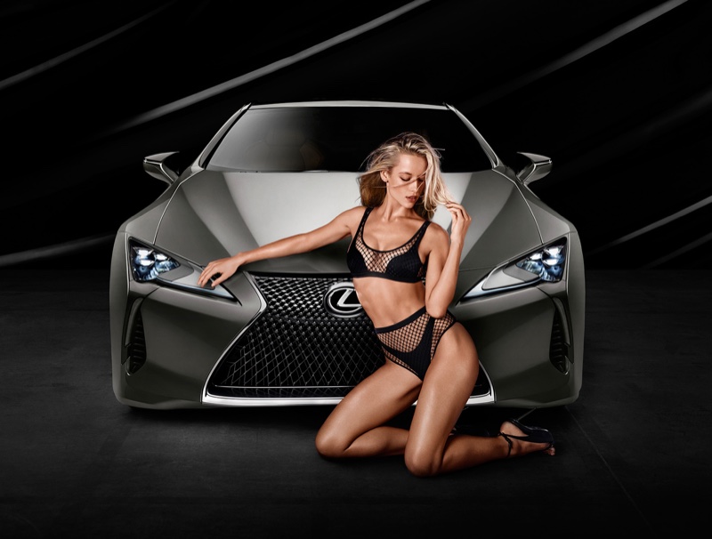 Posing next to the all new Lexus LC 500, Hannah Ferguson models black mesh bikini