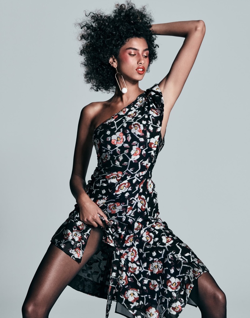 Model Imaan Hammam poses in Isabel Marant dress