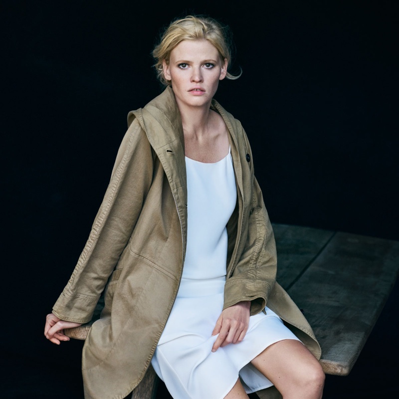 Lara Stone models utility jacket over slip dress in Marc O’Polo’s spring 2017 advertising campaign