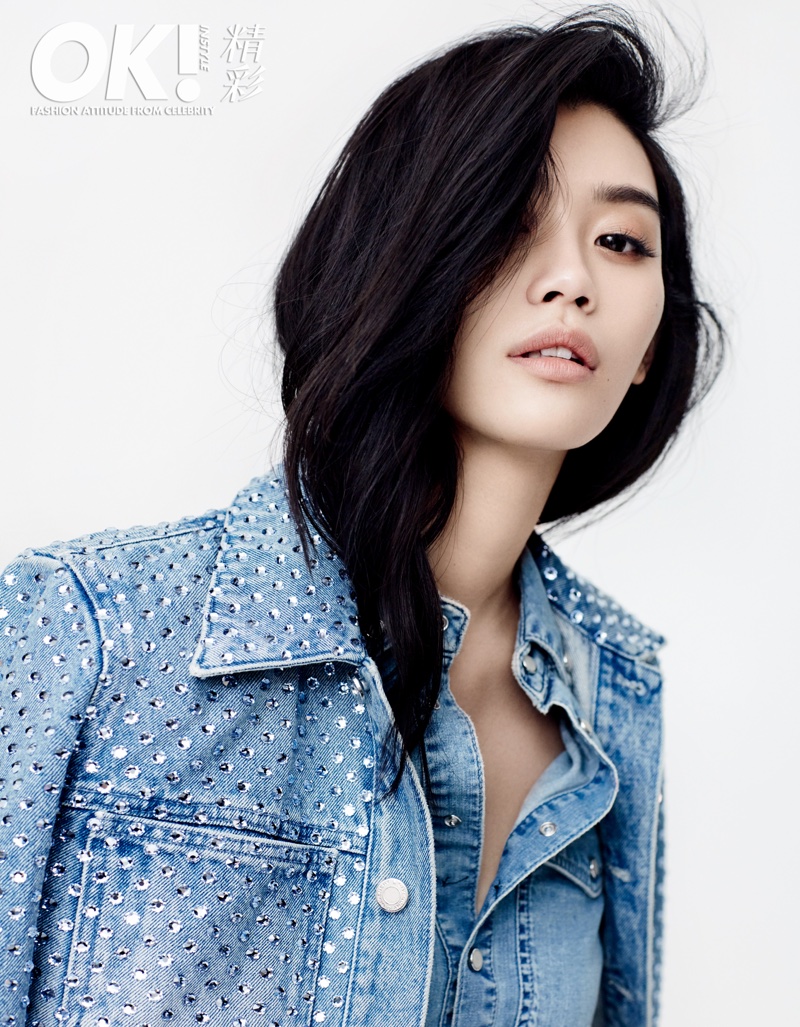 Getting her closeup, Ming Xi wears embellished denim jacket and shirt