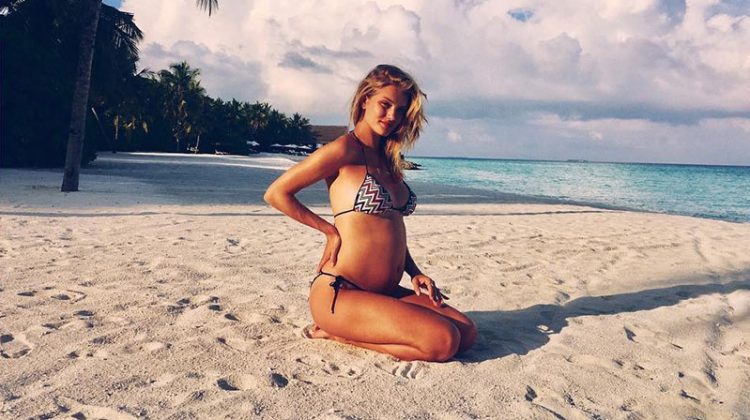 Rosie Huntington-Whiteley poses in bikini while announcing her pregnancy