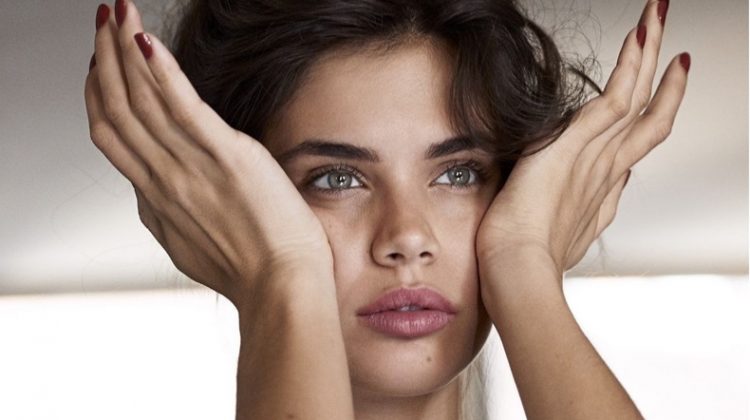 Looking refreshed, Sara Sampaio poses in a lace-trimmed top