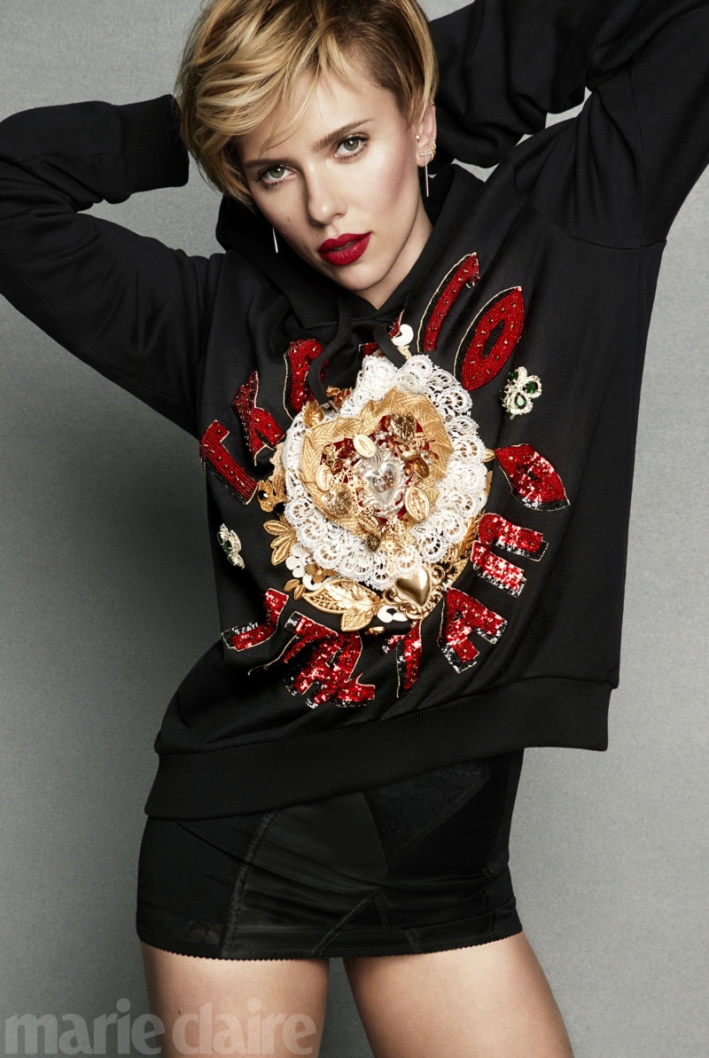 Actress Scarlett Johansson poses in Dolce & Gabbana embroidered hooded sweatshirt