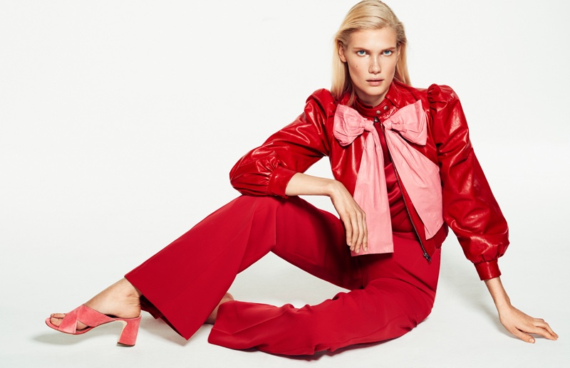 Yulia Terentieva poses in Gucci leather blouson, Atelier Eme pants and Sebastian mules