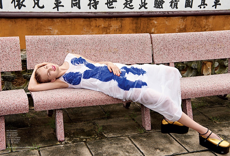 Lounging on a bench, Aneta Pajak models Celine dress and Gucci platforms