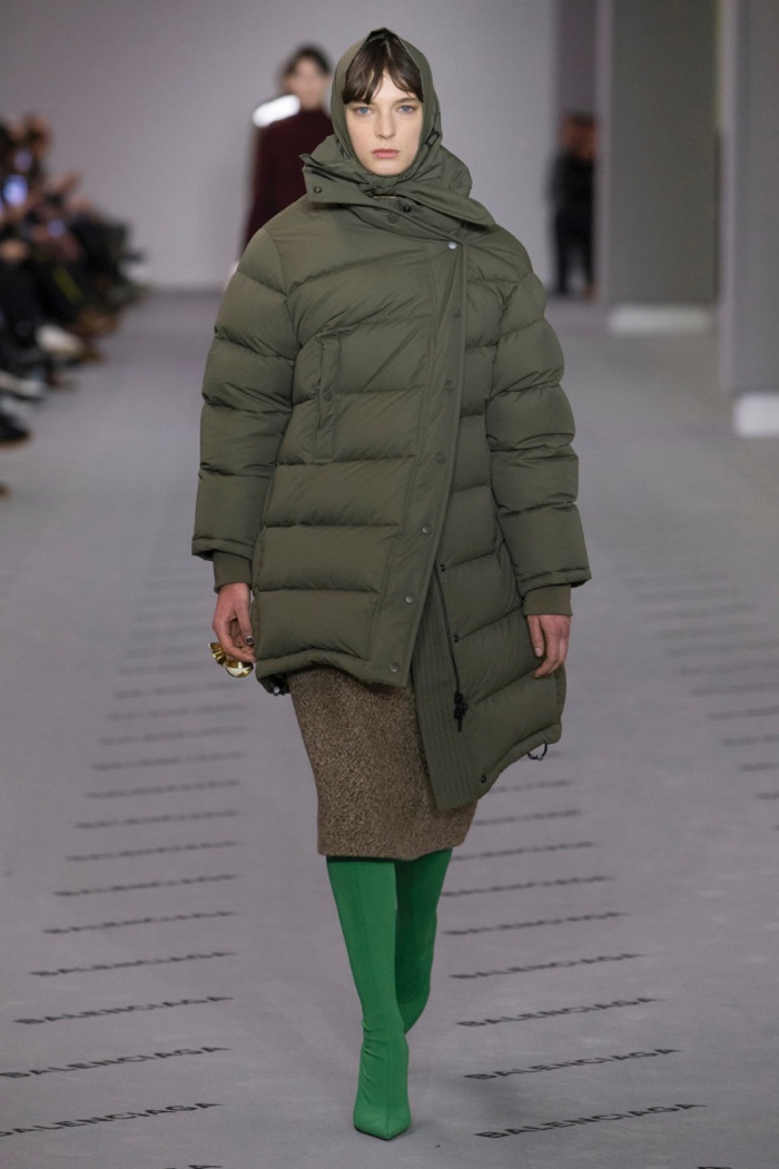 Puffer jacket over mid-length skirt and pointed toe boots from Balenciaga’s fall-winter 2017 collection