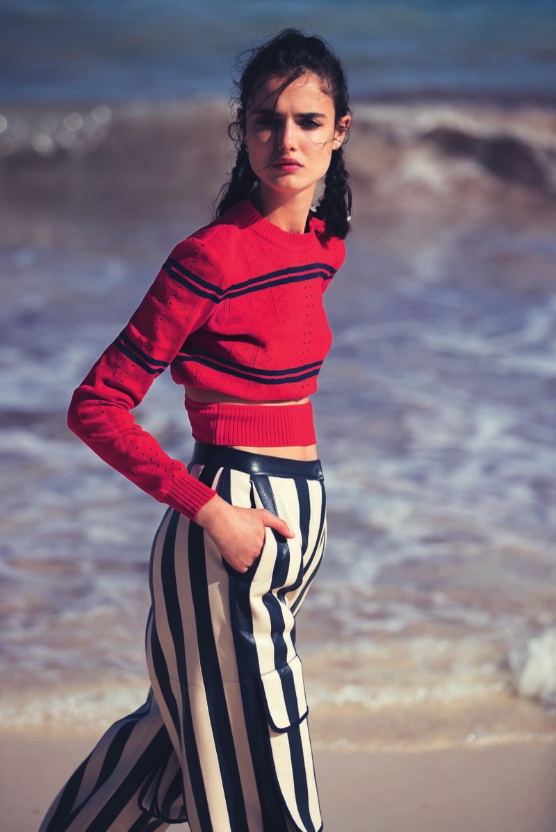 Blanca Padilla models Fendi cropped sweater and striped pants