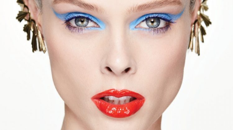 Coco Rocha models blue eyeshadow and red lacquered lips with Gillian Steinhart earrings