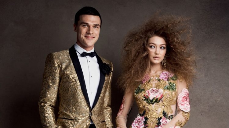 Shining in gold, Gigi Hadid models Dolce & Gabbana dress, earrings, bag and sandals