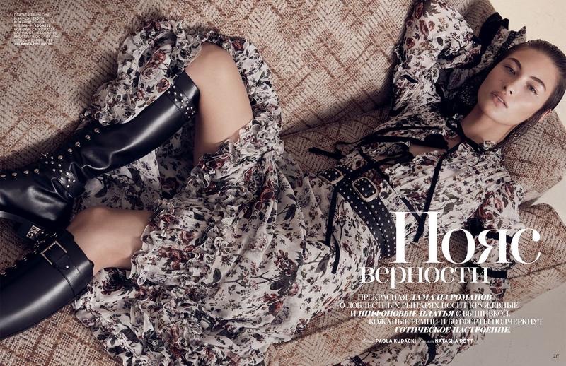 Lounging in style, Grace Elizabeth wears Erdem gown with Alexander McQueen harness and boots