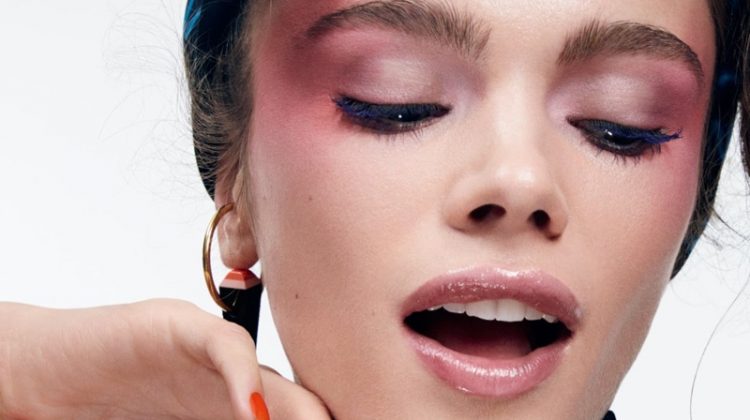 Looking pretty in pink, Jena Goldsack models multi-colored eyeshadow with glossy lip color