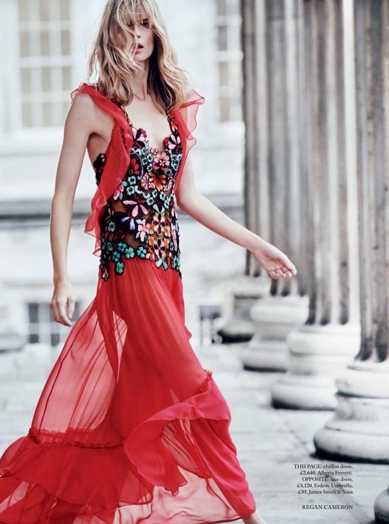 Looking swept-up, Julia Stegner wears Alberta Ferretti gown with floral embroidered bodice