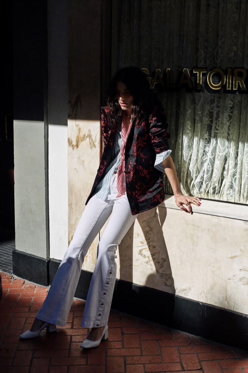 Artist Langley Fox Hemingway wears Mango embroidered jacket and flared denim