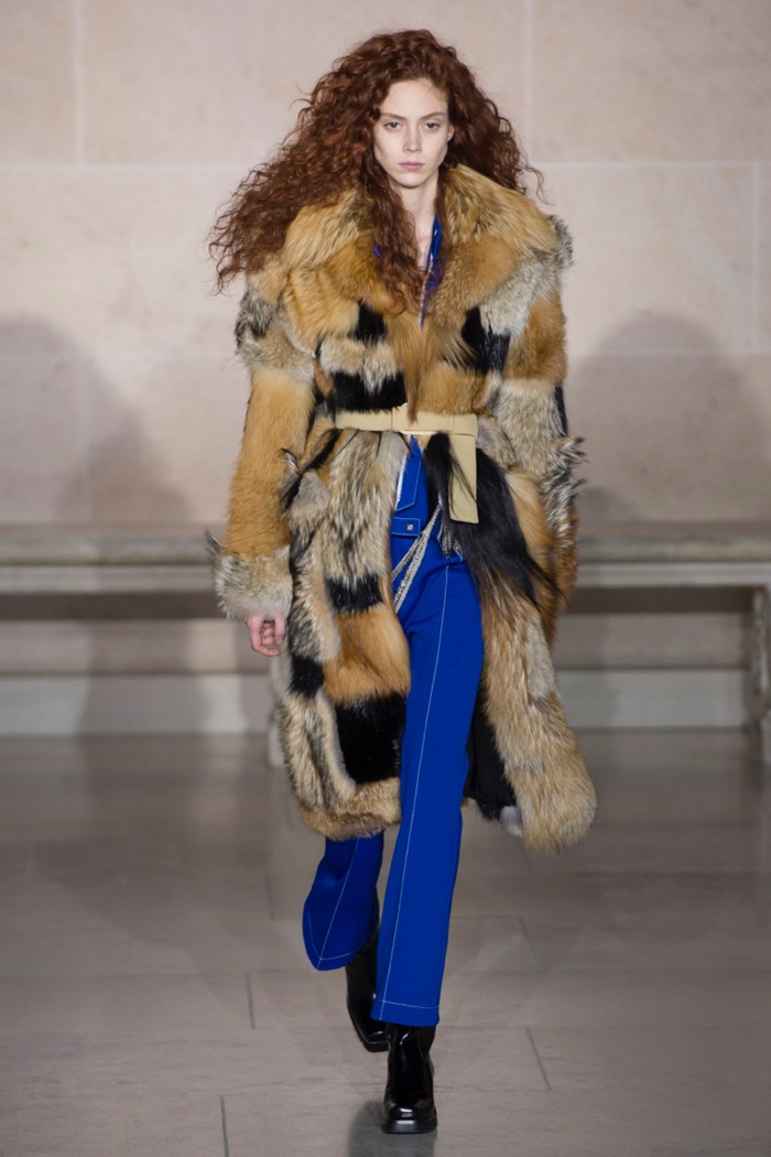 Mixed fur coat over blue jumpsuit from Louis Vuitton’s fall-winter 2017 collection