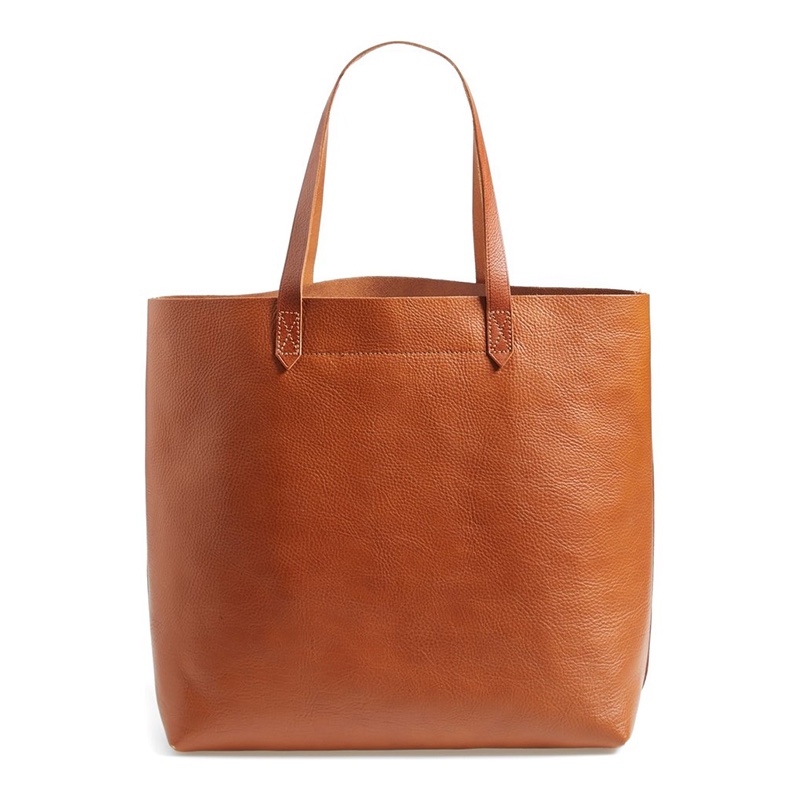 The Transport Leather Tote bag comes in a caramel brown shade