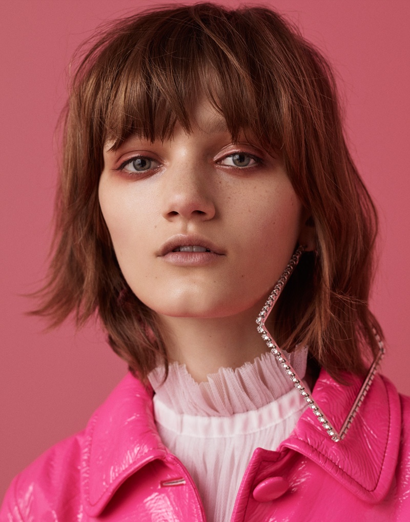 Photographed by Jason Kim, Peyton Knight models pink looks for the fashion editorial