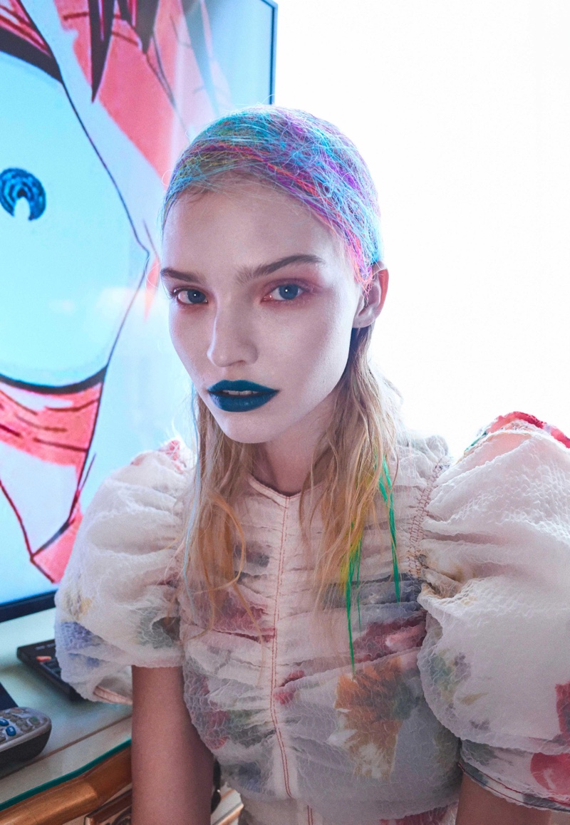 Photographed by Hunter & Gatti, the model poses in eclectic styles