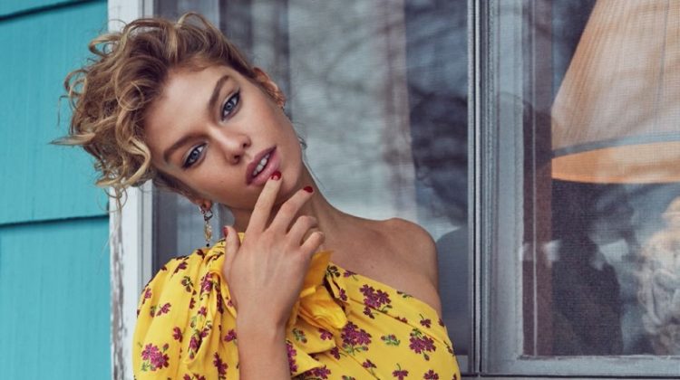 Embracing florals, Stella Maxwell poses in one-sleeve Gucci dress