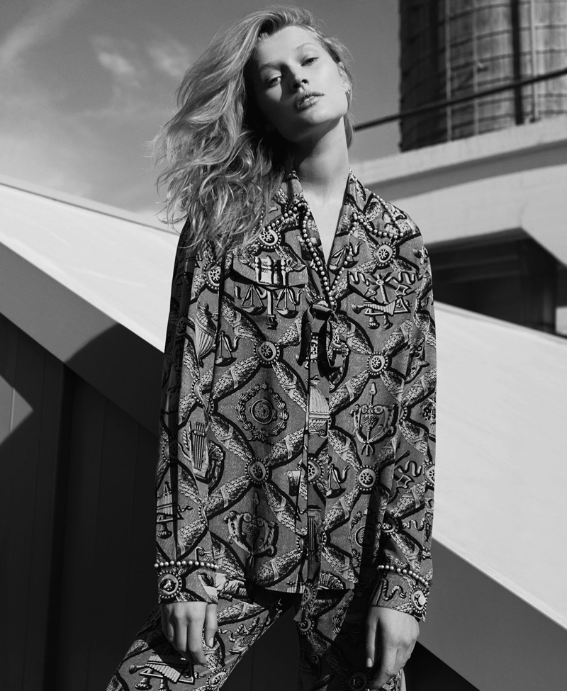 Captured in black and white, Toni Garrn models Gucci top and pants