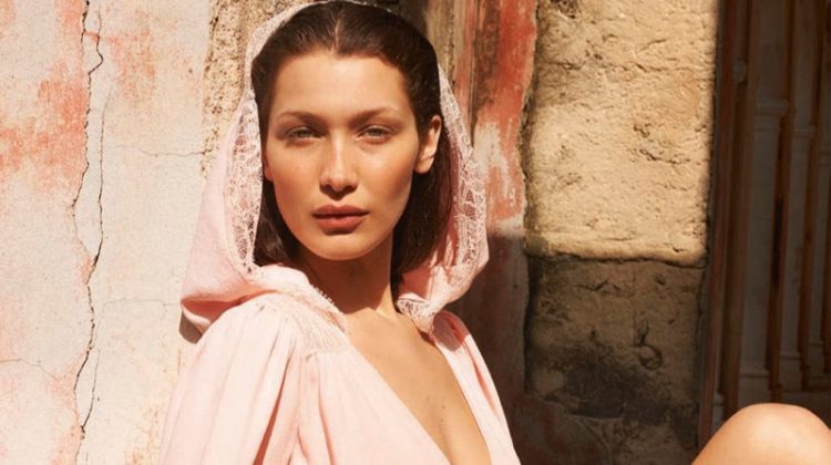 Looking pretty in pink, Bella Hadid poses in dress with lace hood
