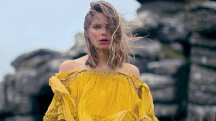 Standing out in yellow, Caroline Brasch Nielsen models Chloe silk organza top and skirt