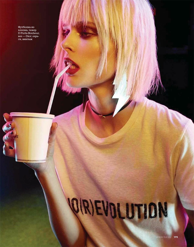 Wearing a blunt platinum blonde bob, Coco Rocha poses in Dior t-shirt