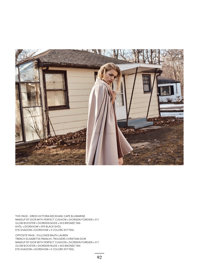 Posing outdoors, Daphne Groeneveld models Victoria Beckham dress with Blumarine cape