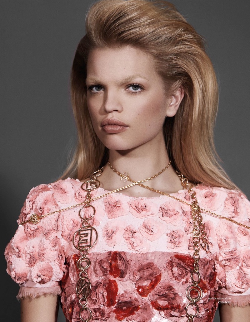 Wearing pink, Daphne Groeneveld wears Chanel necklace and dress